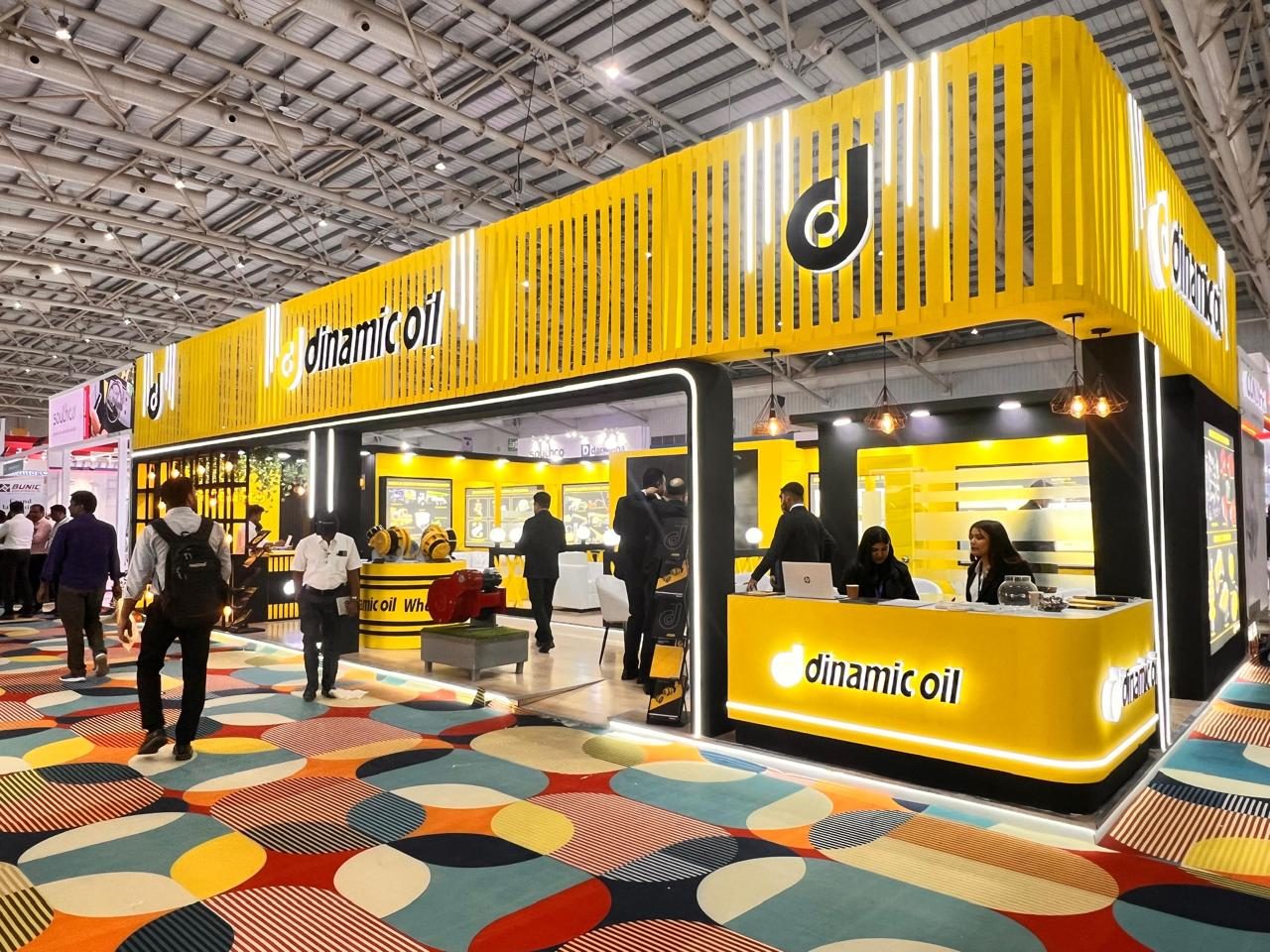 A custom exhibition stand designed and built by Nihar Exhibition on the show floor